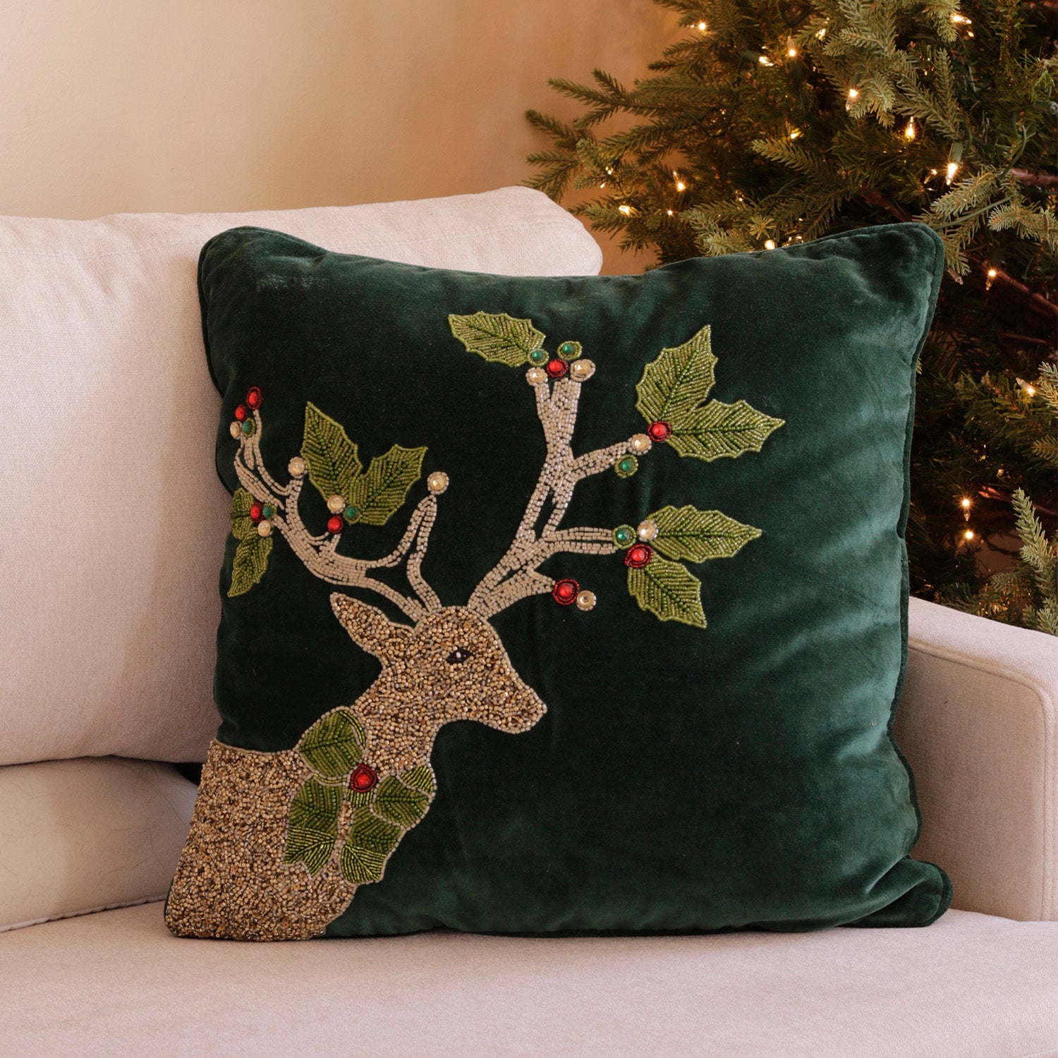holiday-reindeer-with-holly-antlers-throw-pillow