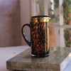 beatriz-ball-glass-tortoise-and-gold-pitcher