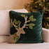 holiday-reindeer-with-holly-antlers-throw-pillow