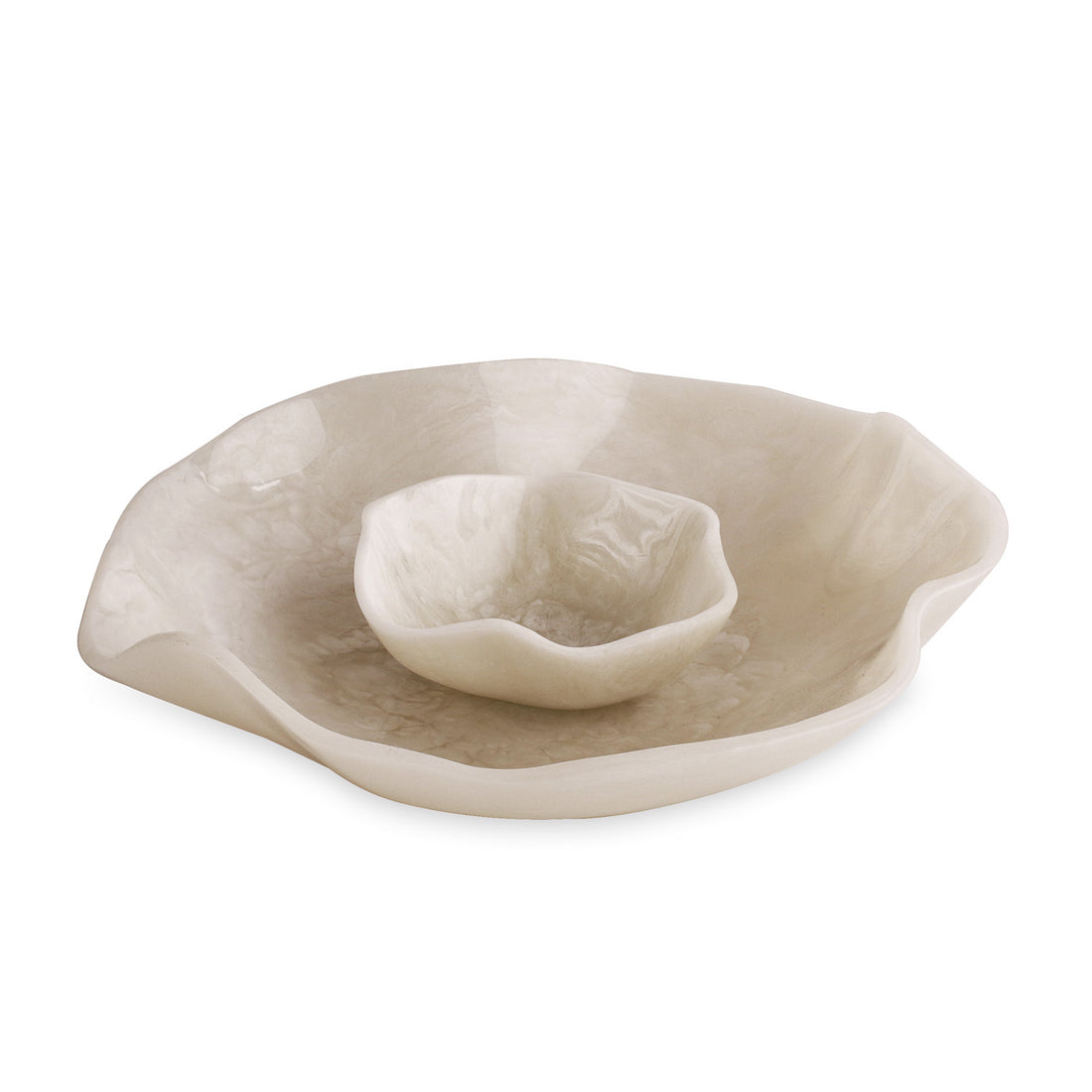 White resin dish with a smaller white dish inside on a white background