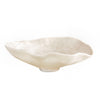 White resin bowl with a textured surface on a white background